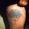 mandala thigh tattoo 