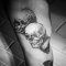 skulls arm tattoo 